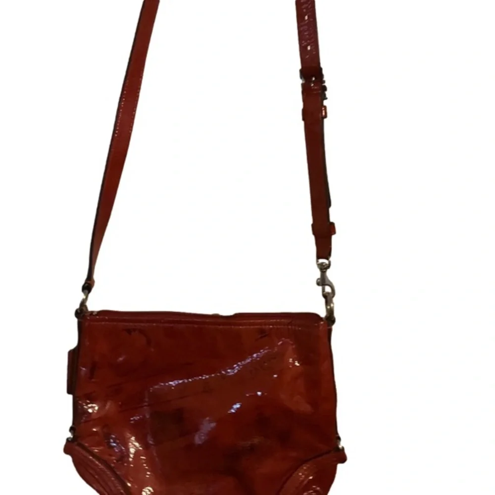 Coach , red patent shoulder bag.